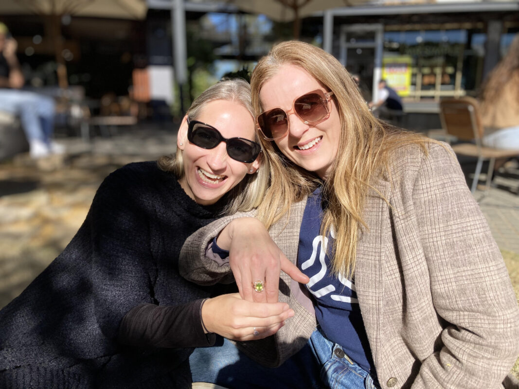 Lisa Messenger with Nadine Naumov Wearing Her Bespoke Custom Made Inspirational Quote Ring Inscribed 'Follow the Sun' Designed by Nadine Naumov at Design Bay Jewellery